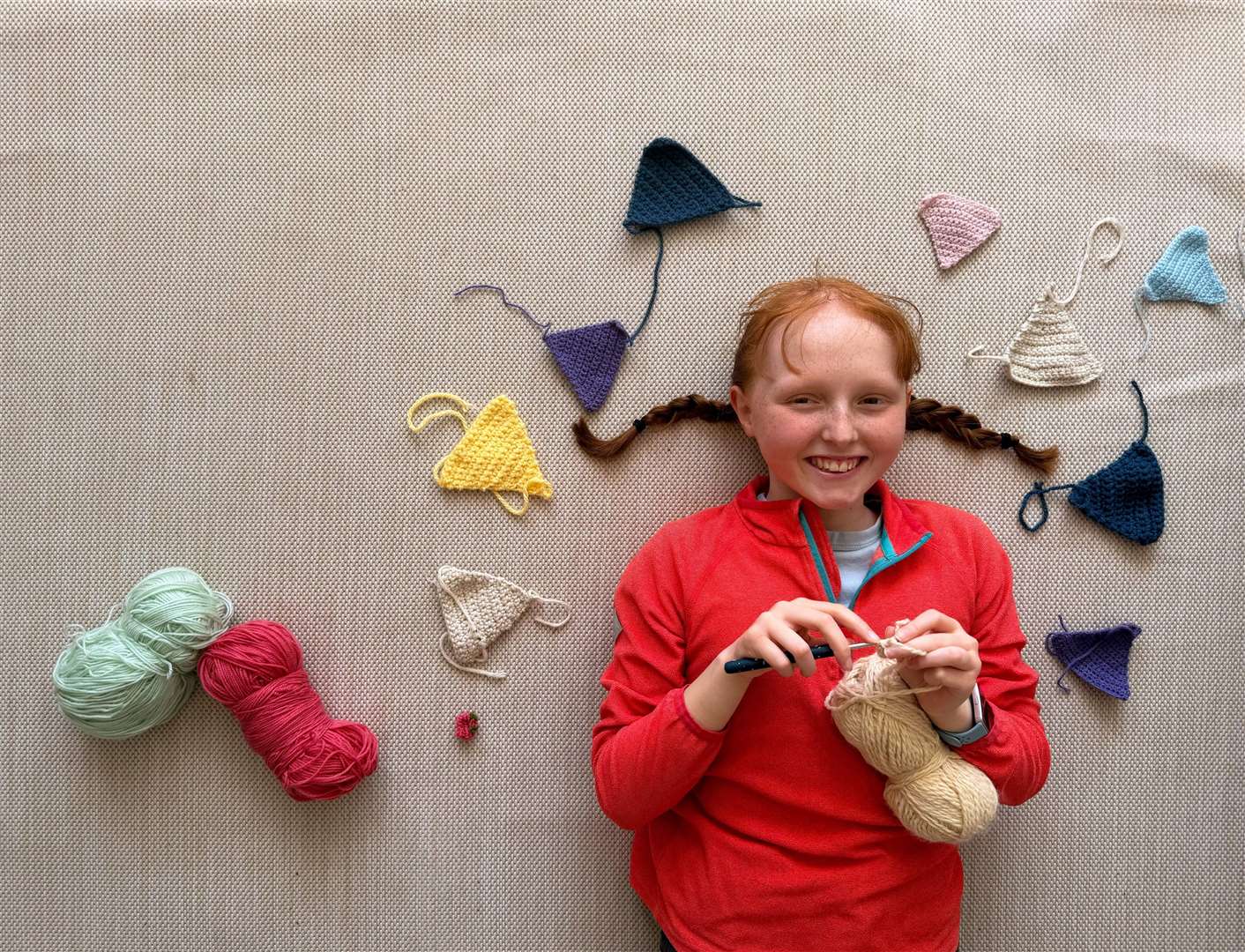 Kirsty Waugh, who is battling cancer, is crocheting 70 bunting triangles to raise money for Children with Cancer UK. Picture: SWNS