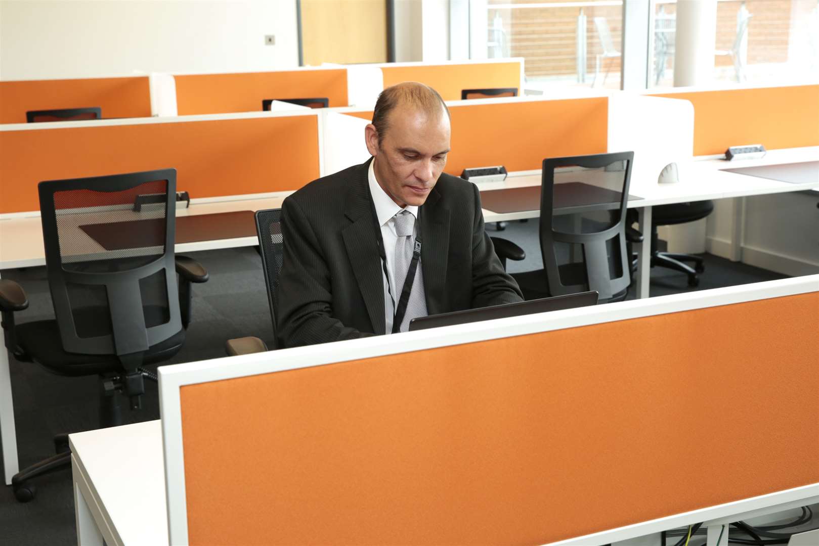 Peter Murphy of Let's Do Business using the hotdesks